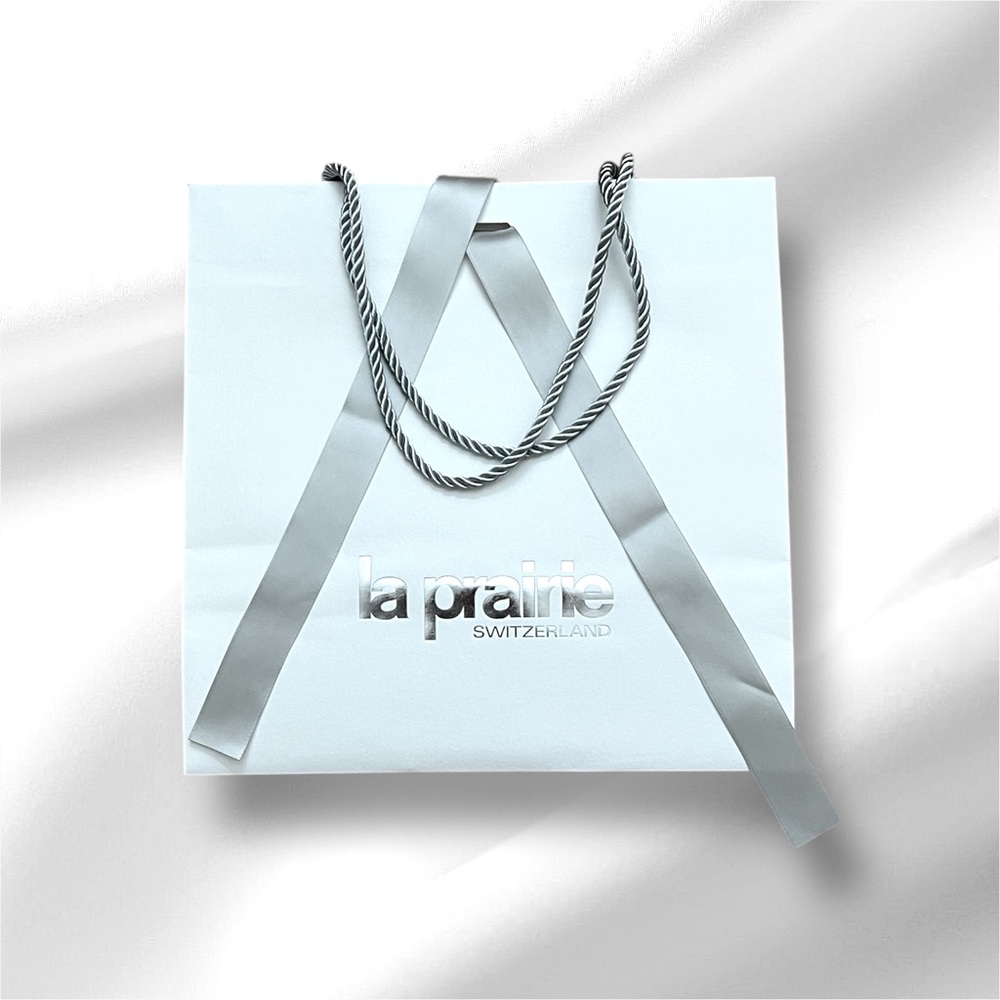 La Prairie Silver and White Gift Bag